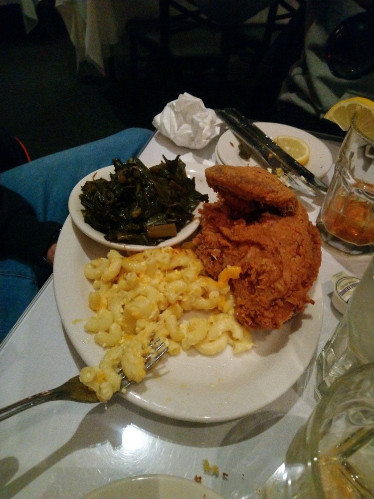Fried chicken with collard greens at Sylvia's