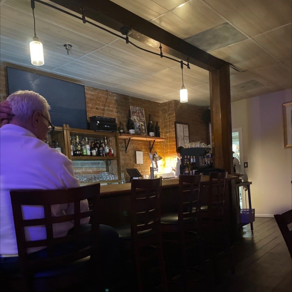 Bar with exposed brick at Trattoria Da Franco's